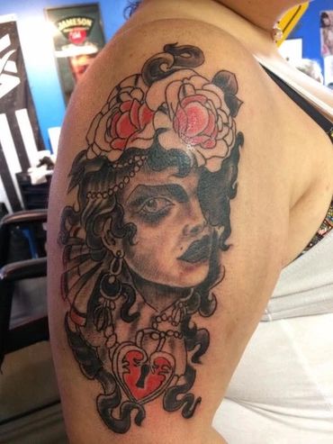 Realistic face tattoo.