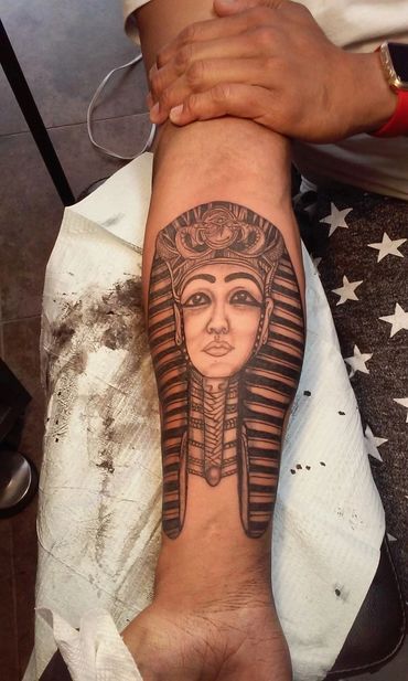 Matching fine line wrist tattoos.