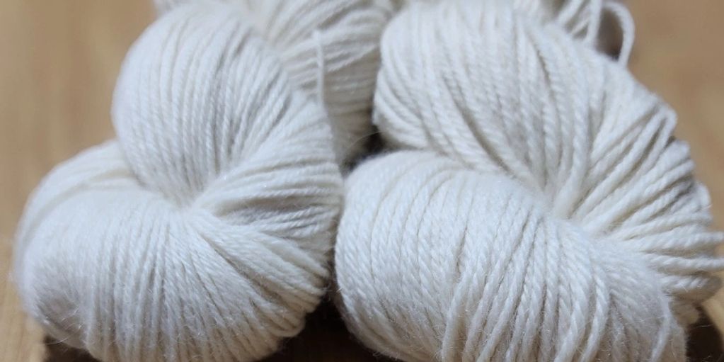 4ply and 8ply 100% alpaca yarn. Shown in 100gm skeins