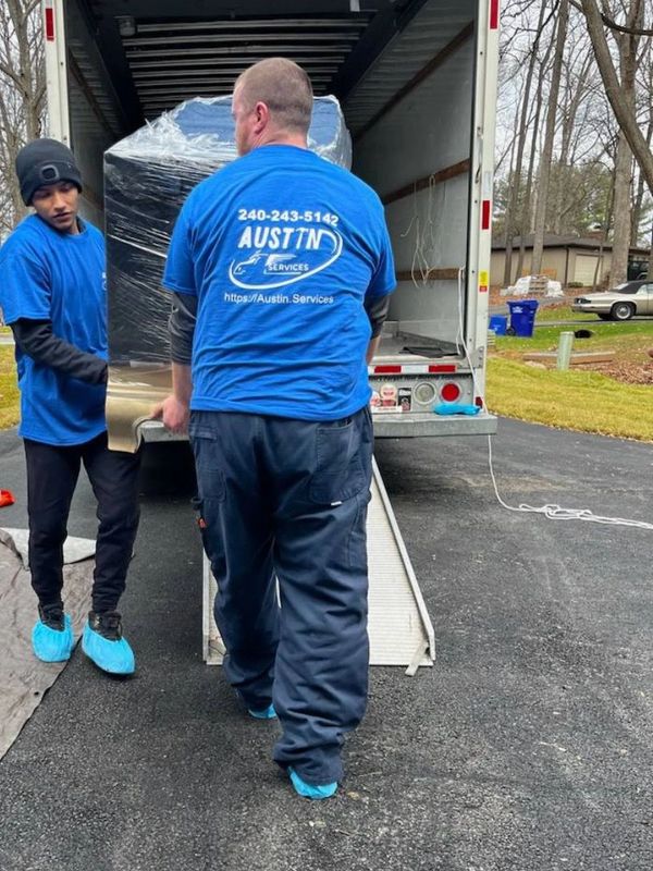 Austin Services Taking Furniture off the truck