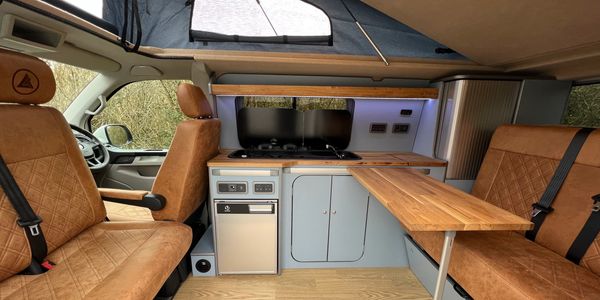 Bespoke campervan conversion. Elevating roof Westdubs, Skyline, SCA, Astons
