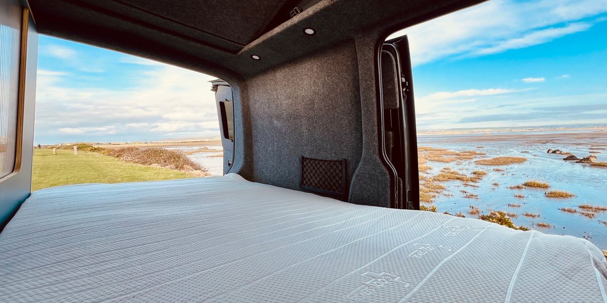 Camper mattress with view of North Devon. Memory foam mattress topper for smart bed, RIB, Rusty Lee
