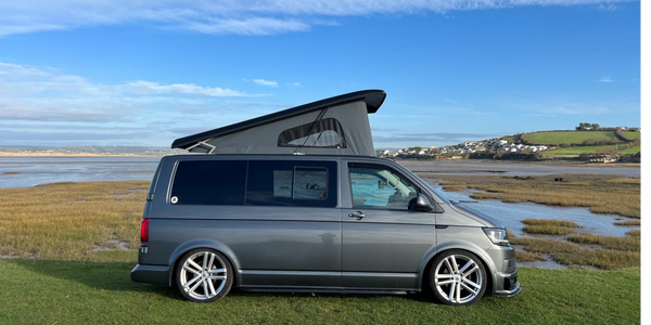 Elevating roof Volkswagen Campervan conversion. Storm, streamline, Altitude. View of North Devon.