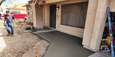 Added 3 ft to driveway and made a front porch slab.