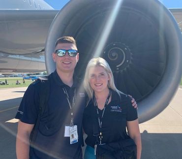 Olivia G and her Boyfriend on the flight line 

Flight 142 - Aviation Marketing 