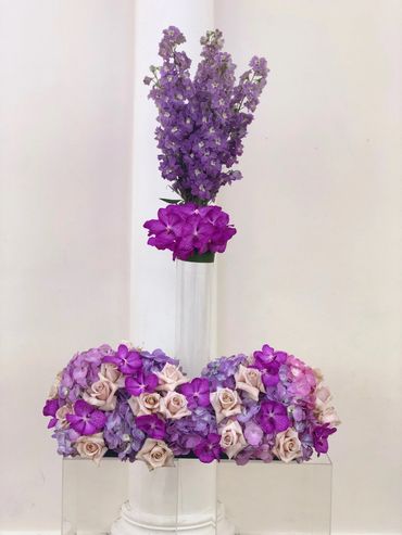 Purple engagement arrangement with vanda orchids, hydrangeas, roses and delphinium 