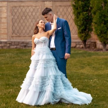 Couple sharing a romantic moment in formal attire.NYC Photography Pricing | Taisha Marie Photos