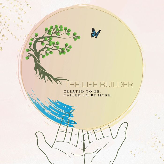 A hand holds a circle with a tree, butterfly, and inspirational text.