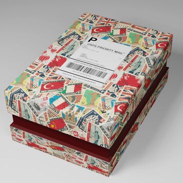 Decorative box covered with international postage stamp designs and a USPS Priority Mail label.