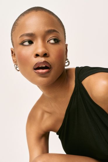 natural makeup for an editorial photoshoot with eyeliner and lip liner