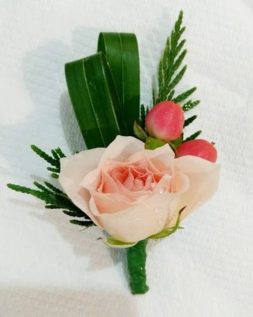 Pink rose buttonhole boutonniere