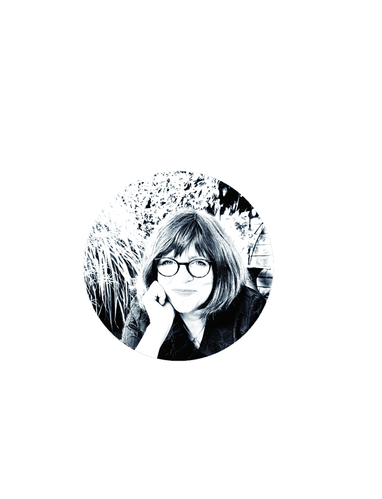 Black and white portrait of a woman with glasses.