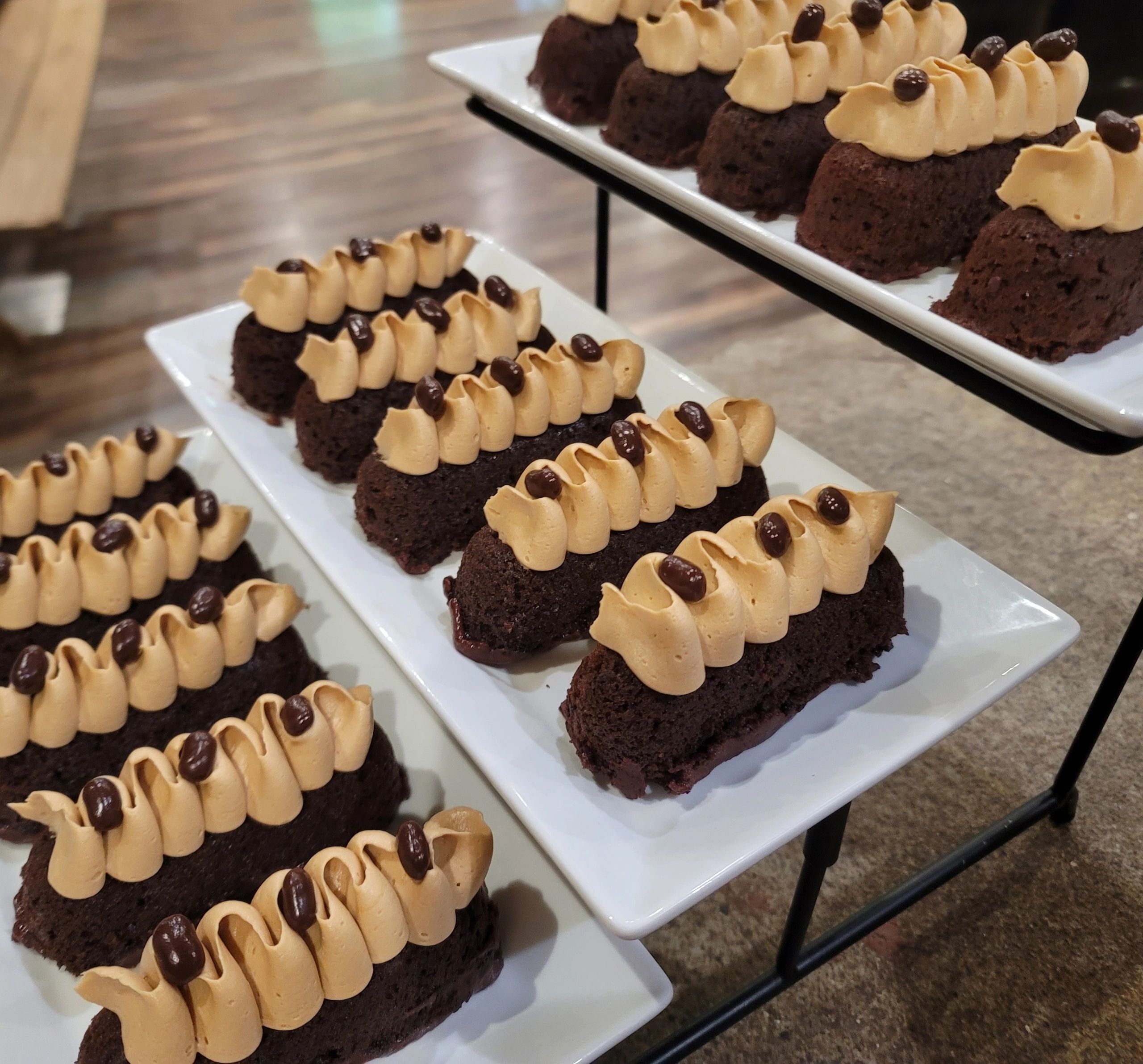 Stamme Espresso in a bed of dark chocolate ganache, topped with a ribbon of espresso buttercream, an
