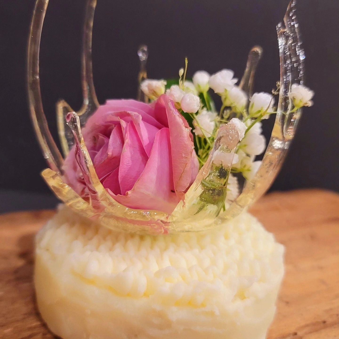 Red Velvet Cake Pucks in Cream Cheese Frosting, garnished with a Sugar Splash that holds a mini flor