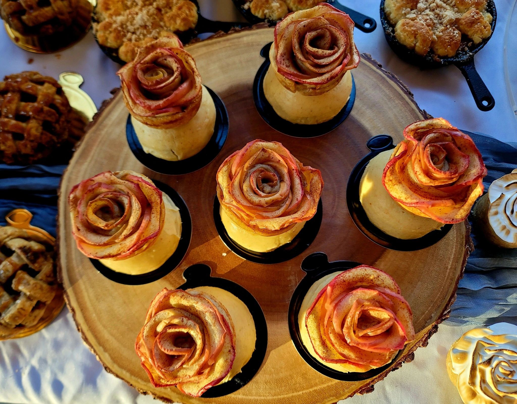 Apple Spice Cake Rounds covered in Browned Butter & Cinnamon Buttercream, topped with spiced Apple R