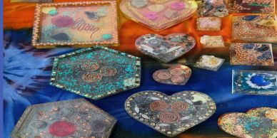 Decorative mosaic art pieces on cloth.