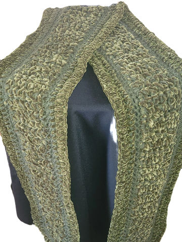 Handmade olive green crocheted scarf with a textured pattern.