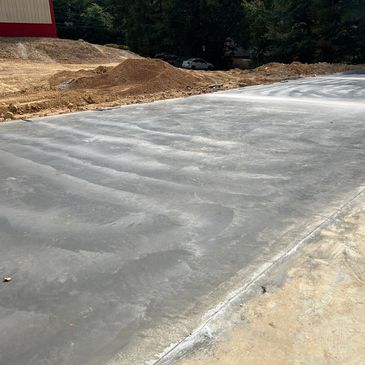 6" Slick finish Monolitic slab for pole barn.