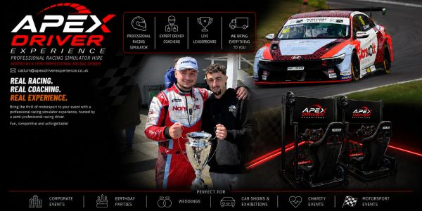 Apex Driver Experience racing simulation setup with trophies and a race car.