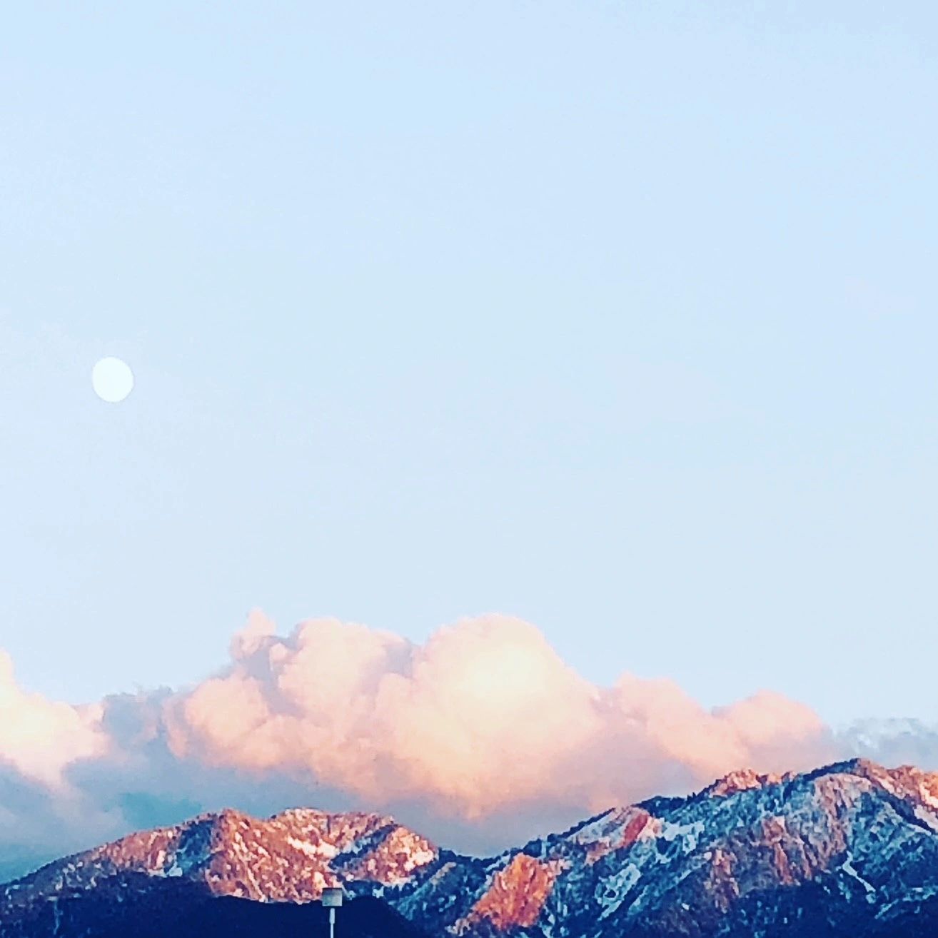 Photo credit: Elizabeth Bellit, full moon rising over the Wasatch