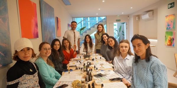 Aromatherapy gemstone workshop elixir with rough-cut natural stones and essential oils