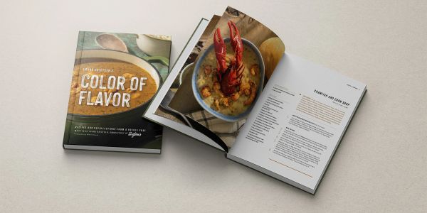 Two cookbooks, one titled "Color of Flavor."