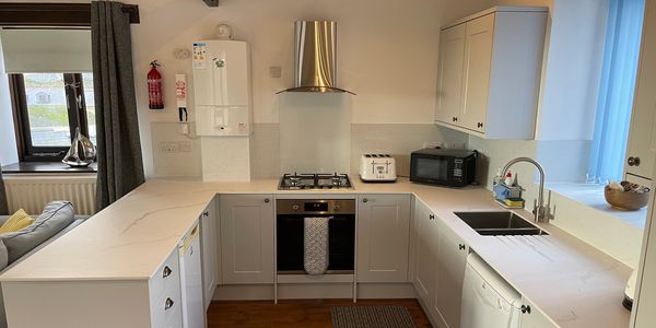 New kitchen inside Banjo Cottage, Looe, Cornwall