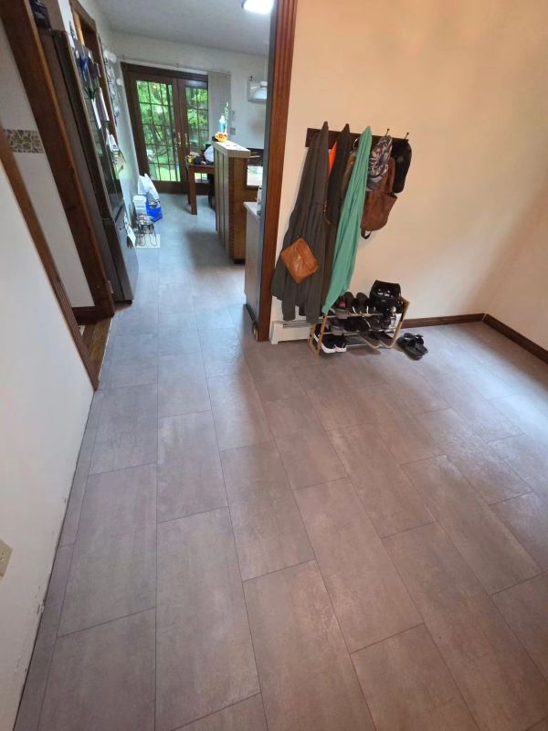 Entryway with coat rack and shoe organizer.
