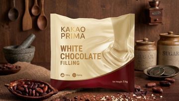 Kakao Prima white chocolate filling package on rustic kitchen table.