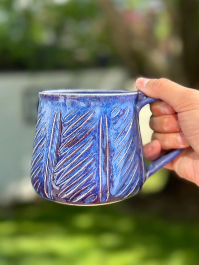 Handmade ceramic purple mug