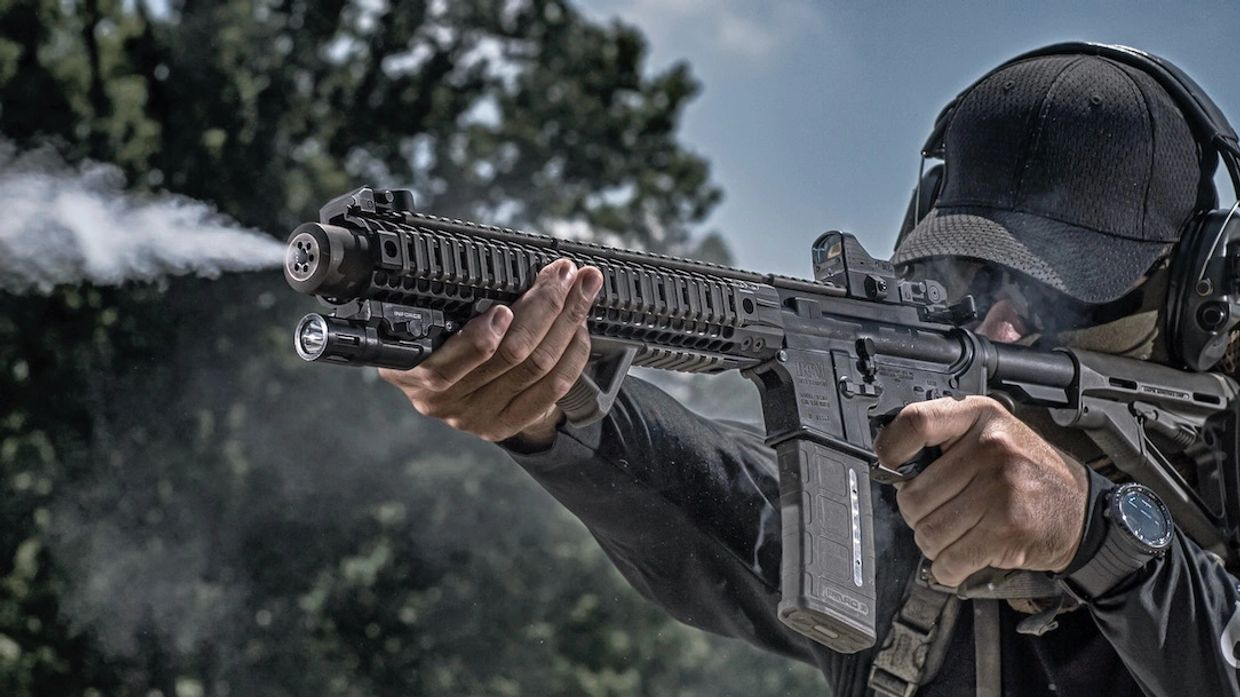 Abner Miranda Tier 1 Citizen shooting an AR-15 with a Gemtech Trek-T Titanium Suppressor. 