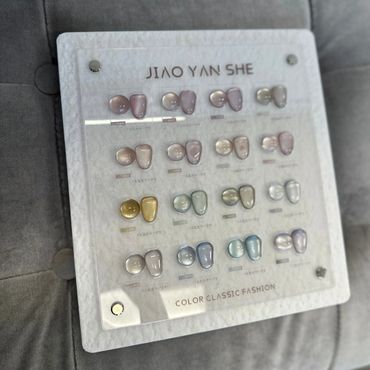 Display board showing various nail polish color samples.