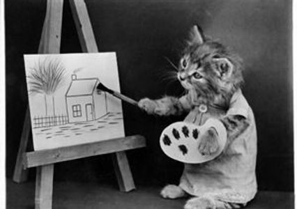 dressed up cat painting a picture