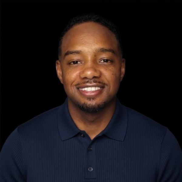 Picture of President and Board Chair Demetric Brown Smiling