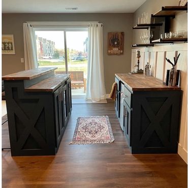 Custom built 2 piece navy blue basement bar.