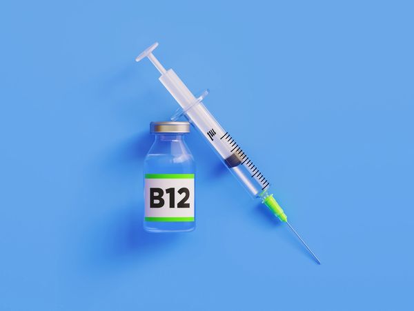 Vial labeled "B12" with a syringe.