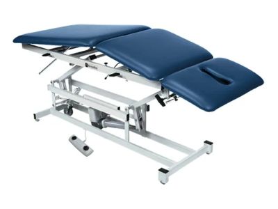 Adjustable medical examination table with blue cushions.