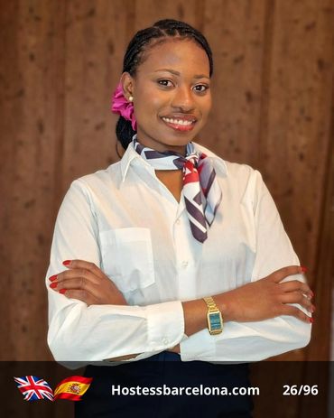 Multilingual hostess welcoming visitors at a major exhibition at Fira Barcelona