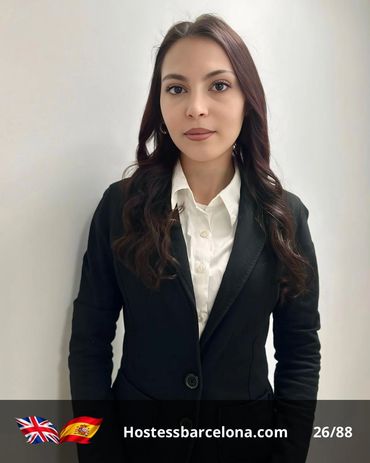 Corporate event hostess assisting clients at a major Barcelona trade fair.