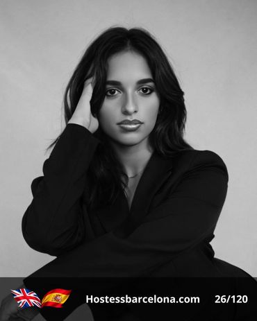 Experienced event hostess assisting clients during a high-profile trade show