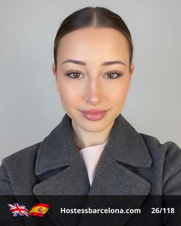Professional hostess managing stand hospitality during a global event.