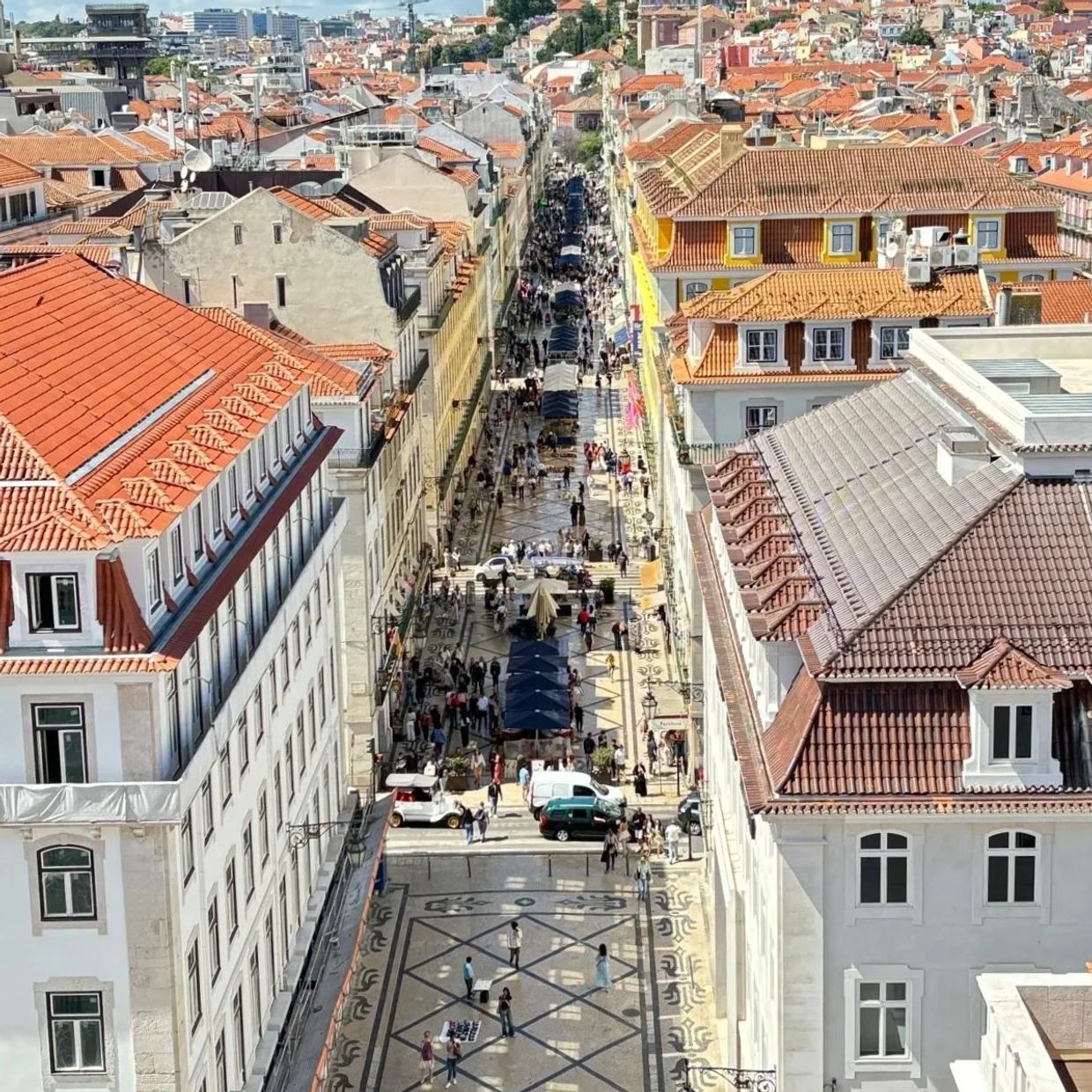 Overhead shot of Rua Augusta, Lisbon's major pedestrian area. It's a partly cloudy day