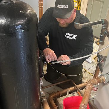 This is Josh wiring in a boiler recirculating pump