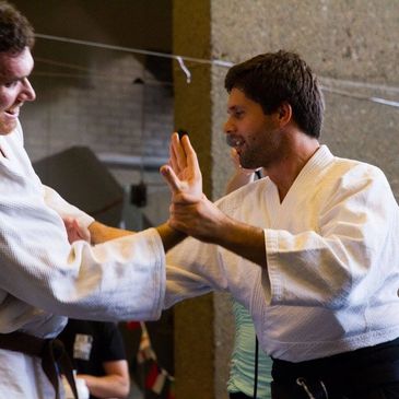 Martial art instructor demonstrating a wrist lock as a self-defence tool.