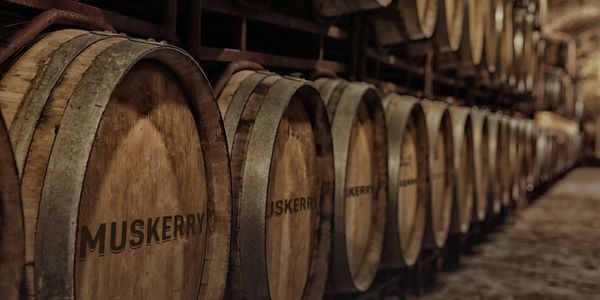 Barrels of Muskerry Irish Whiskey in a distillery