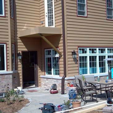 Foam Backed siding,Burgundy trim , new windows