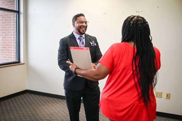 Jerrell Stokley and a woman are laughing 