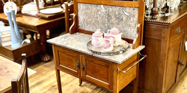 Stunning washstand with marble top and backsplash situated in the Streets of London Antique shop