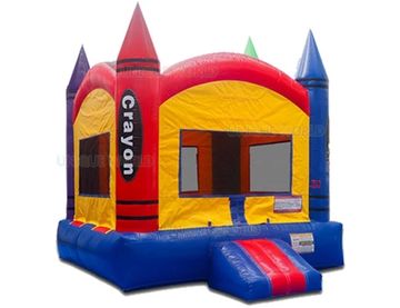 Colorful inflatable bounce house shaped like crayons.