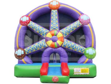 Colorful inflatable Ferris wheel bounce house for kids.